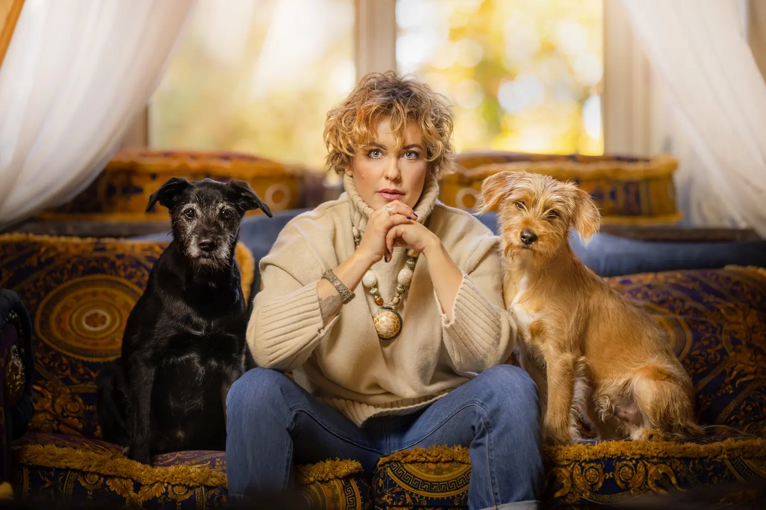 Agnieszka Janarek with two dogs during a Tromplo training session